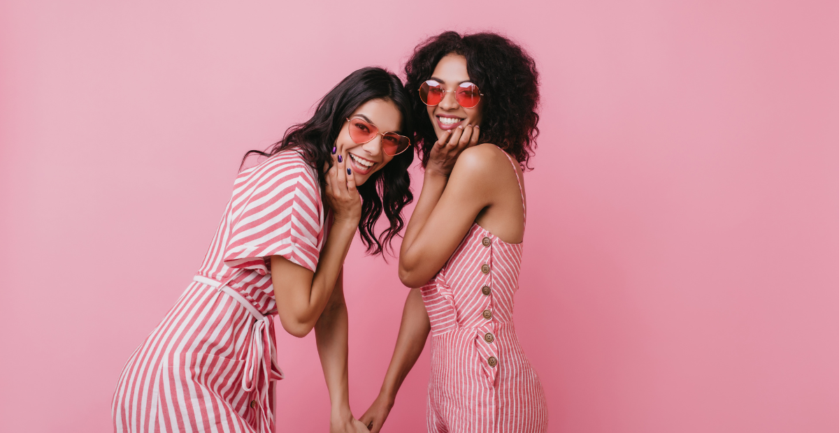 Two girls in pink clothes for Barbie themed hen