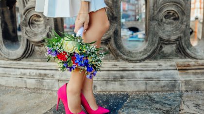Woman in heels with flowers
