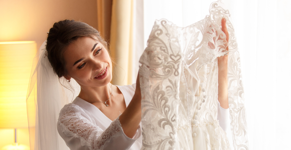 Woman looking at wedding dress